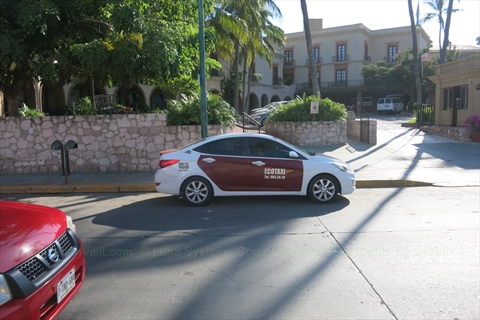 red eco taxi in Mazatlán, Sinaloa, Mexico