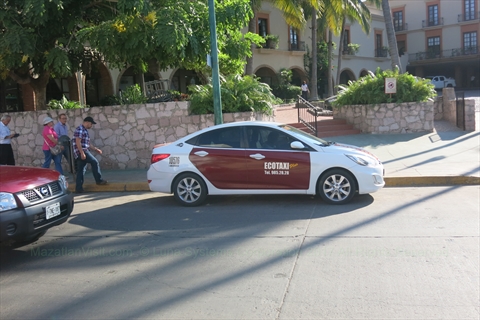 red eco taxi in Mazatlán, Sinaloa, Mexico